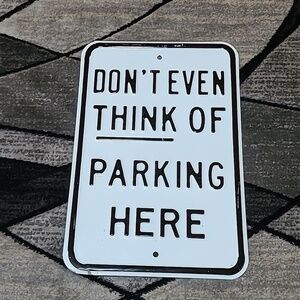 DON'T EVEN THINK OF PARKING HERE HEAVY-DUTY METAL SIGN